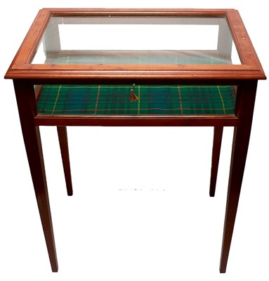 Lot 369 - A GLASS TOPPED DISPLAY TABLE