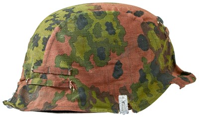 Lot 821 - A GERMAN WAFFEN SS MAN'S M1942 TYPE HELMET AND COVER