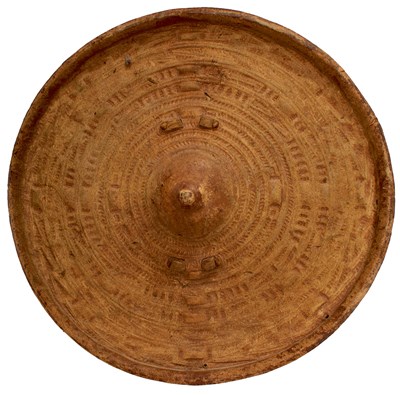 Lot 619 - A 19TH CENTURY SUDANESE HIDE SHIELD OR BUCKLER