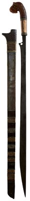 Lot 105 - A 19TH CENTURY INDONESIAN SULAWESI OR CELEBES SHORT SWORD