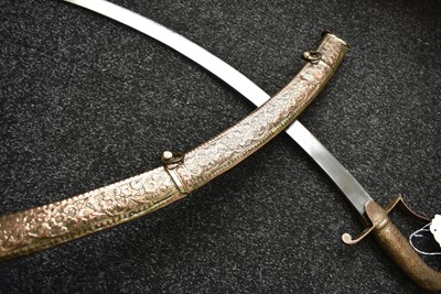 Lot 46 - A 19TH CENTURY SIKH SHAMSHIR SHIKARGAR