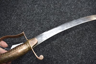 Lot 46 - A 19TH CENTURY SIKH SHAMSHIR SHIKARGAR