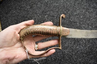 Lot 46 - A 19TH CENTURY SIKH SHAMSHIR SHIKARGAR
