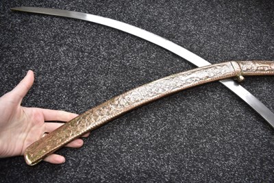 Lot 46 - A 19TH CENTURY SIKH SHAMSHIR SHIKARGAR