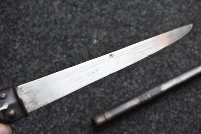 Lot 73 - A LATE 18TH OR EARLY 19TH CENTURY BHUTANESE OR TIBETAN DAGGER