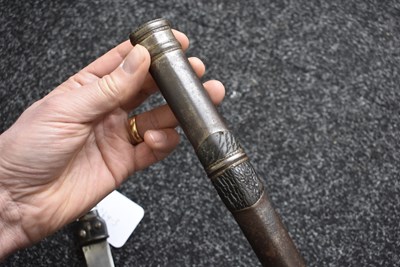 Lot 73 - A LATE 18TH OR EARLY 19TH CENTURY BHUTANESE OR TIBETAN DAGGER