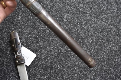 Lot 73 - A LATE 18TH OR EARLY 19TH CENTURY BHUTANESE OR TIBETAN DAGGER