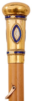 Lot 878 - A GEORGE III GOLD AND ENAMEL MOUNTED LADY'S RIDING CROP
