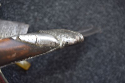 Lot 72 - A MIDDLE EASTERN JAMBIYA OR DAGGER