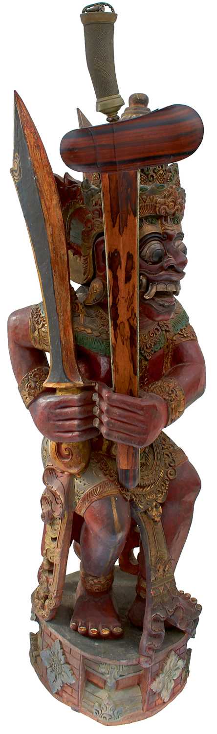 Lot 35 - A GOOD LATE 19TH CENTURY INDONESIAN (BALI) RAWANA KRIS STAND