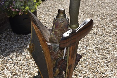 Lot 35 - A GOOD LATE 19TH CENTURY INDONESIAN (BALI) RAWANA KRIS STAND