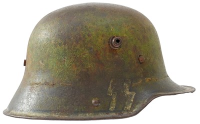 Lot 600 - A FIRST AND SECOND WAR GERMAN M1916 HELMET