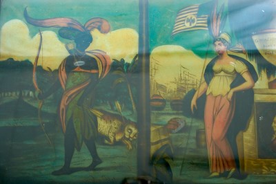 Lot AN EARLY 19TH CENTURY REVERSE GLASS PRINT