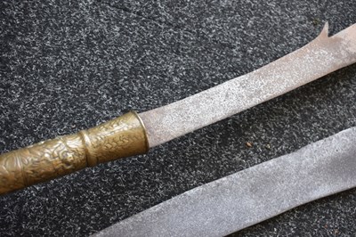 Lot 60 - TWO 18TH CENTURY LAN NA KINGDOM DHAAB NGAO HOWDAH SWORDS