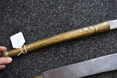 Lot 60 - TWO 18TH CENTURY LAN NA KINGDOM DHAAB NGAO HOWDAH SWORDS