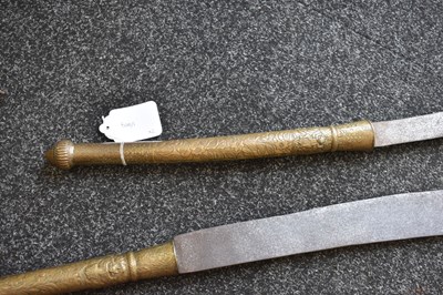 Lot 60 - TWO 18TH CENTURY LAN NA KINGDOM DHAAB NGAO HOWDAH SWORDS