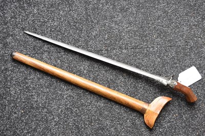 Lot 25 - A LATE 19TH OR EARLY 20TH CENTURY INDONESIAN PANJANG OR EXECUTIONER'S KRIS
