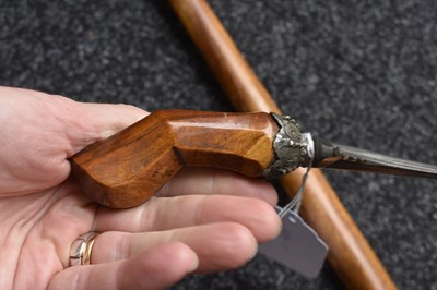 Lot 25 - A LATE 19TH OR EARLY 20TH CENTURY INDONESIAN PANJANG OR EXECUTIONER'S KRIS