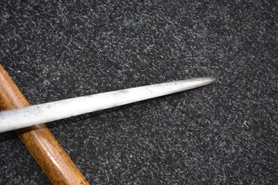 Lot 25 - A LATE 19TH OR EARLY 20TH CENTURY INDONESIAN PANJANG OR EXECUTIONER'S KRIS