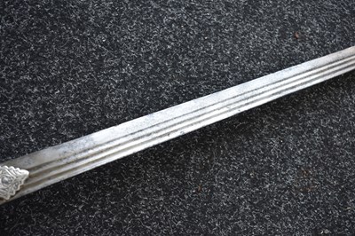 Lot 47 - A LATE 18TH OR EARLY 19TH CENTURY SILVER DECORATED INDIAN FIRANGI OR SWORD