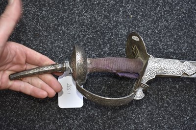 Lot 47 - A LATE 18TH OR EARLY 19TH CENTURY SILVER DECORATED INDIAN FIRANGI OR SWORD