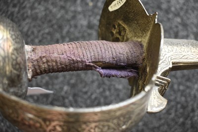 Lot 47 - A LATE 18TH OR EARLY 19TH CENTURY SILVER DECORATED INDIAN FIRANGI OR SWORD