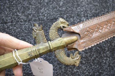 Lot 34 - A LATE 19TH CENTURY SINHALESE OR CEYLONESE KASTANE OR SHORT SWORD