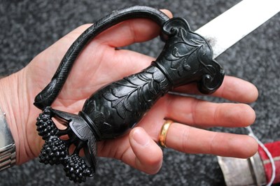Lot 48 - A GOOD 19TH CENTURY BASALT HILTED INDIAN SHAMSHIR