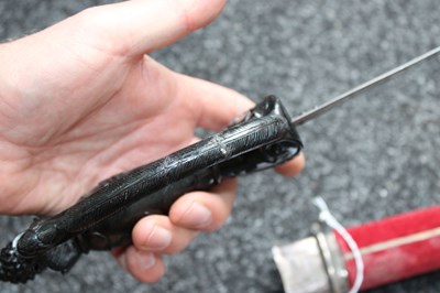 Lot 48 - A GOOD 19TH CENTURY BASALT HILTED INDIAN SHAMSHIR