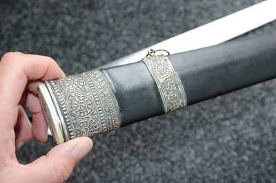 Lot 67 - AN OMANI KATTARA OR SWORD