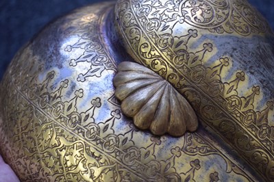 Lot 55 - A MID TO LATE 19TH CENTURY INDIAN SIKH TURBAN HELMET