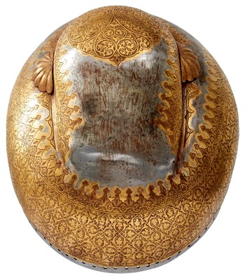 Lot 55 - A MID TO LATE 19TH CENTURY INDIAN SIKH TURBAN HELMET