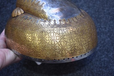 Lot 55 - A MID TO LATE 19TH CENTURY INDIAN SIKH TURBAN HELMET