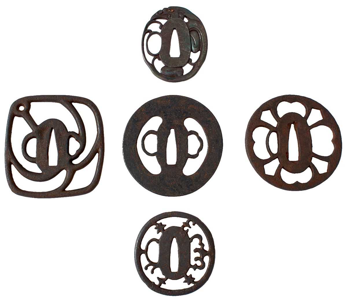 Lot 12 - A SMALL COLLECTION OF FIVE JAPANESE ARCHAIC IRON TSUBA