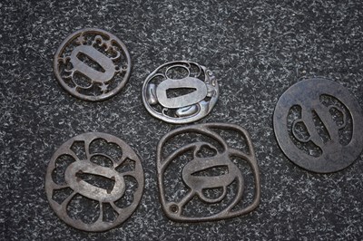 Lot 12 - A SMALL COLLECTION OF FIVE JAPANESE ARCHAIC IRON TSUBA
