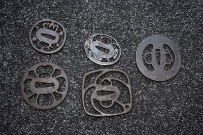 Lot 12 - A SMALL COLLECTION OF FIVE JAPANESE ARCHAIC IRON TSUBA