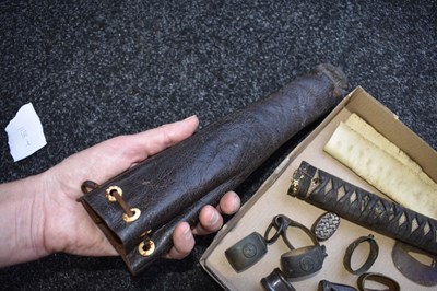 Lot 14 - A BOX OF JAPANESE SWORD FITTINGS