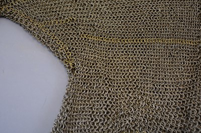 Lot 36 - A 19TH CENTURY INDIAN SIKH MAIL SHIRT FOR A BOY
