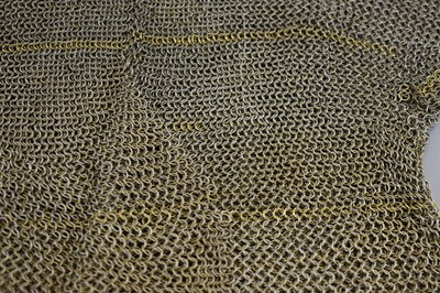 Lot 36 - A 19TH CENTURY INDIAN SIKH MAIL SHIRT FOR A BOY